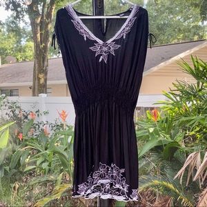 Beach cover up with adjustable sleeves!